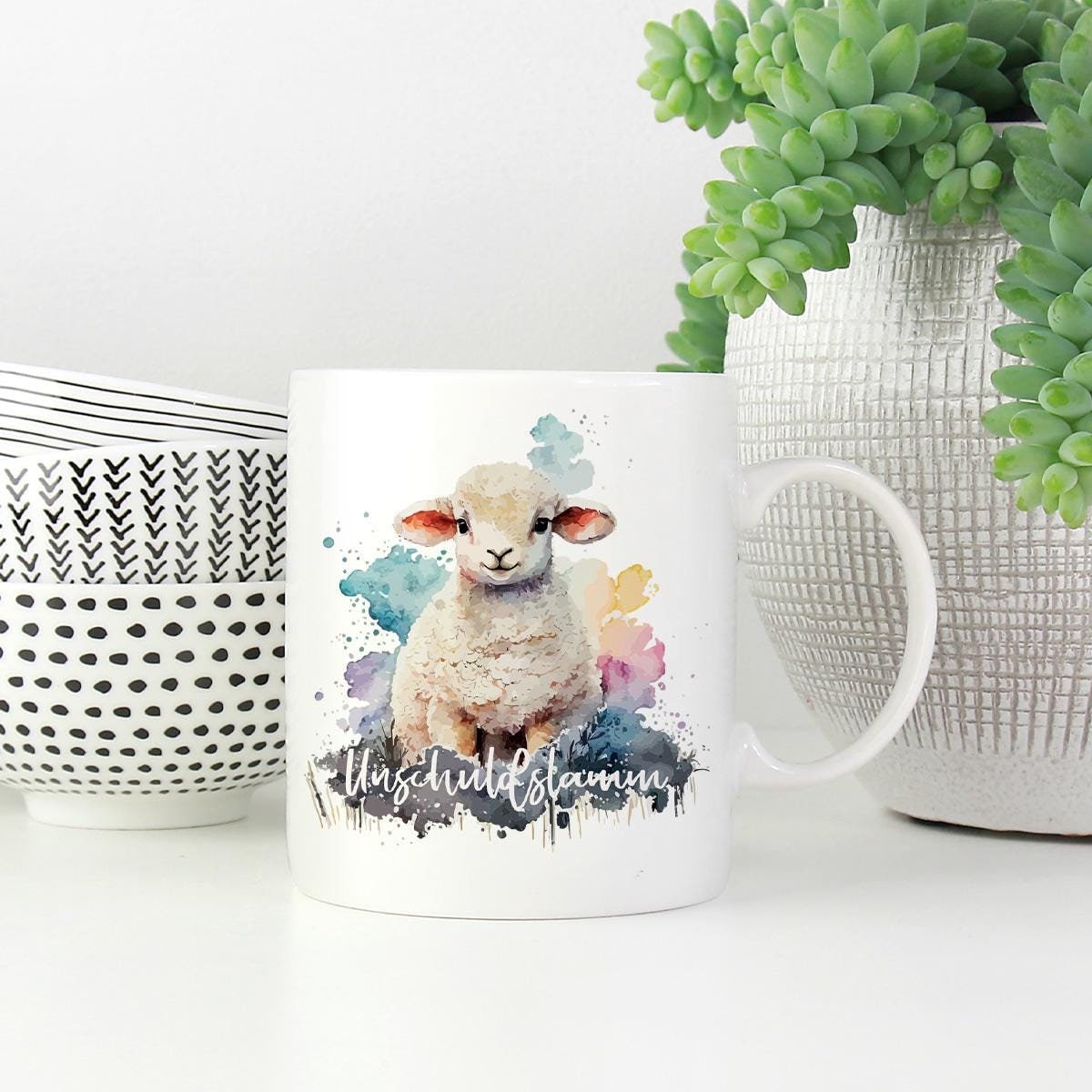 Hübsche Tasse mit Lamm und dem Wort "Unschuldslamm"